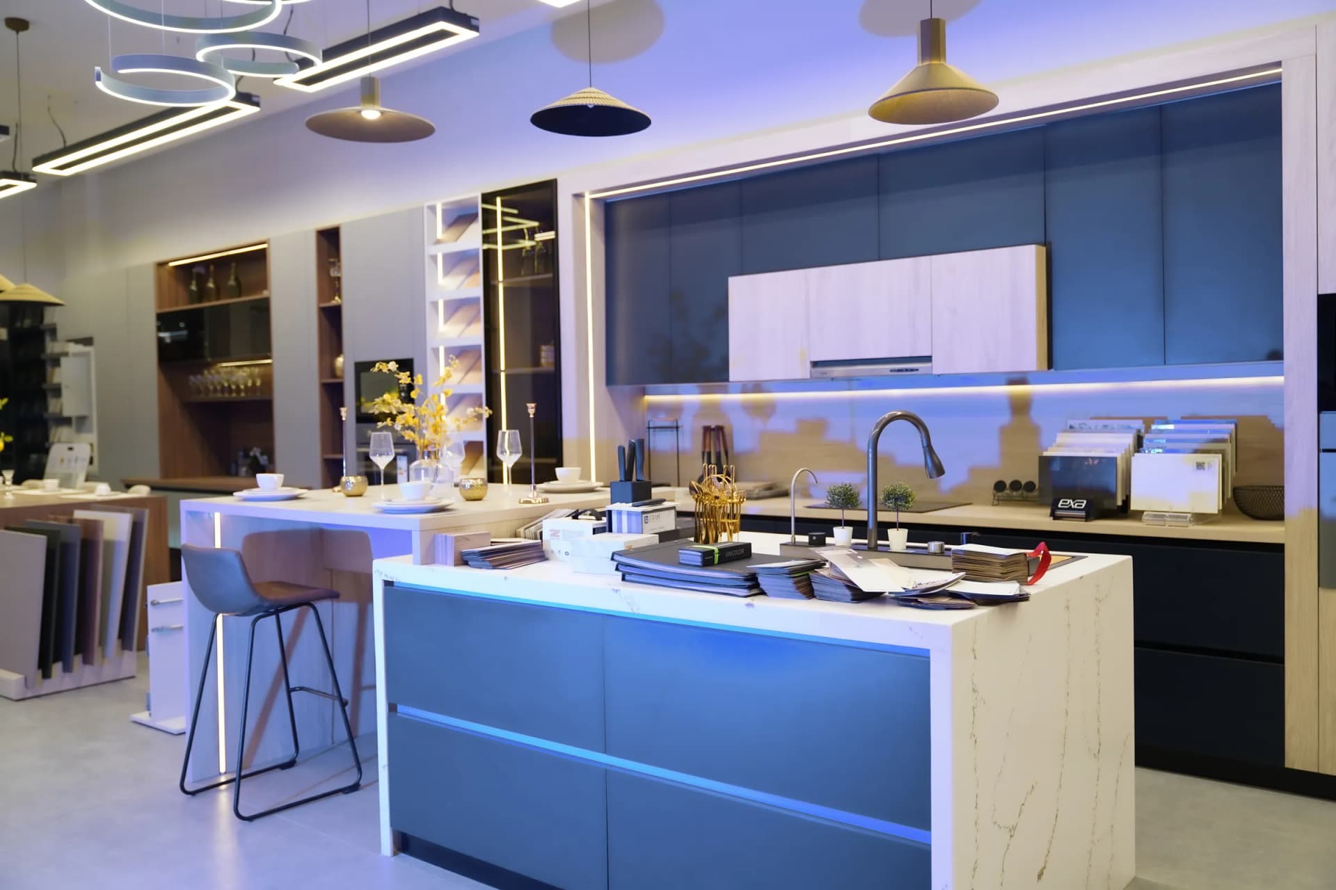 Detailed Kokio kitchen cabinetry and warm wood finishes — تفاصيل مطبخ كوكايو